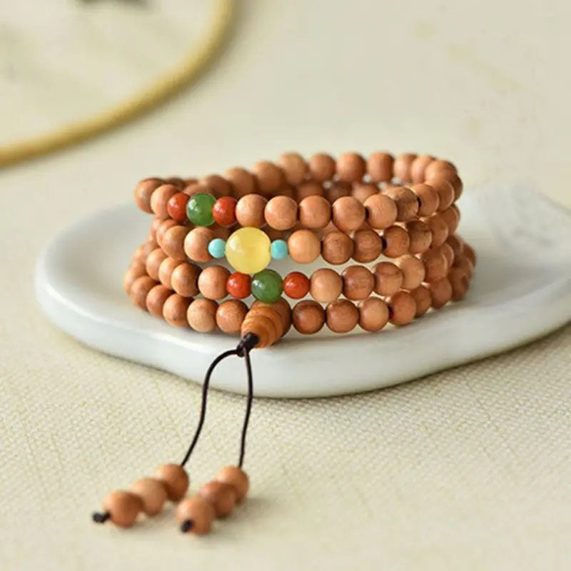 Peach wood multi-circle bracelet, beeswax lucky beads