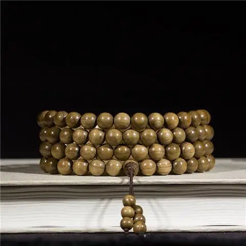 Golden nanmu bracelet, natural wooden Buddhist beads