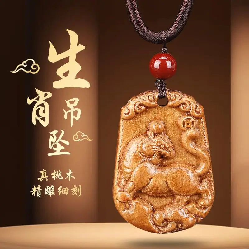 Peach wood zodiac carved pendant