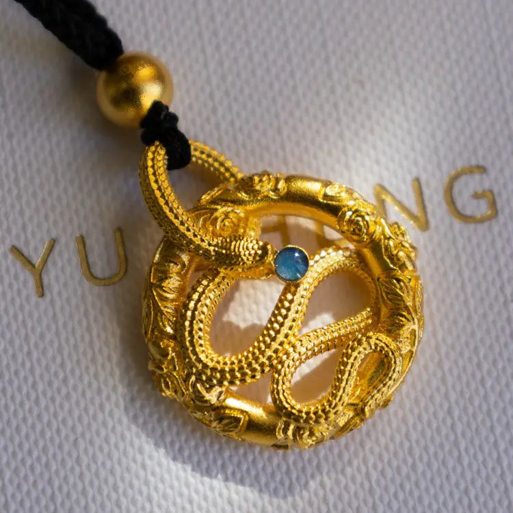 Golden snake round pendant