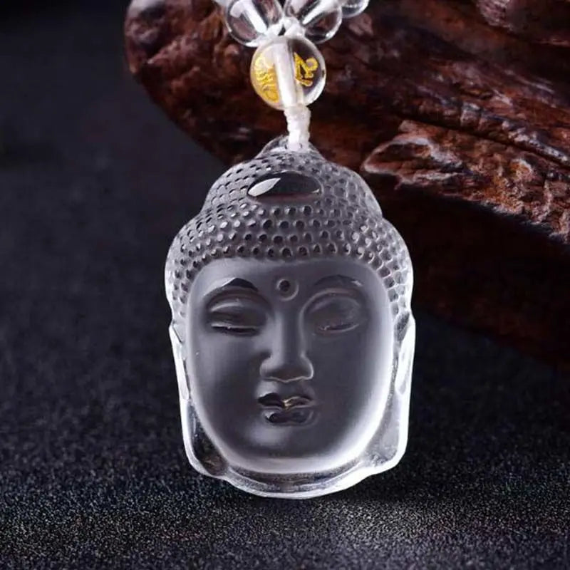 White crystal carved Buddha head pendant