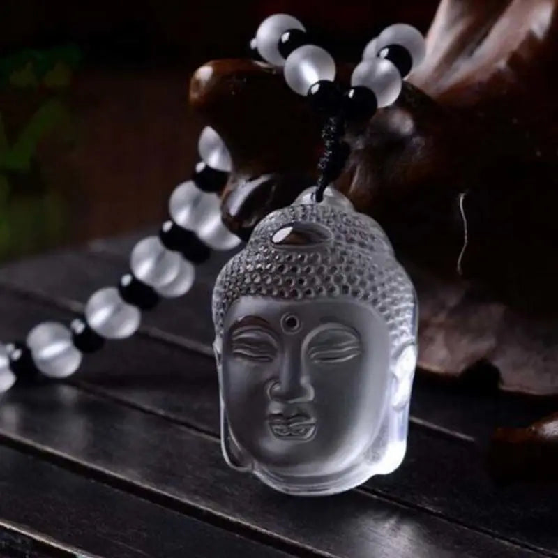 White crystal carved Buddha head pendant