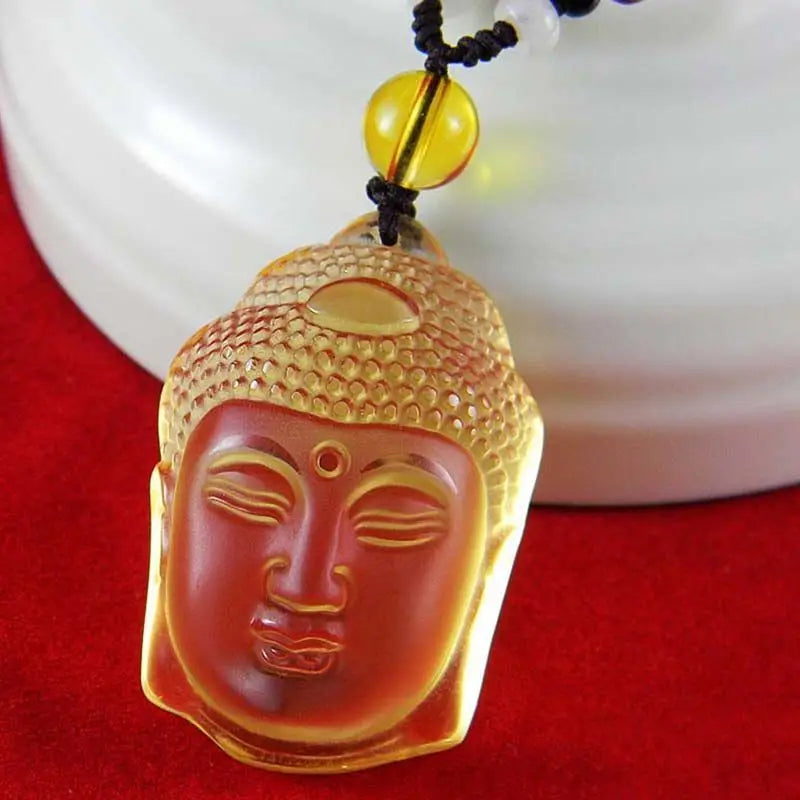 White crystal carved Buddha head pendant