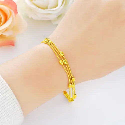 Gold women's bracelet