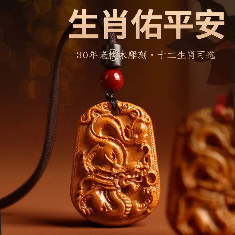 Peach wood zodiac carved pendant
