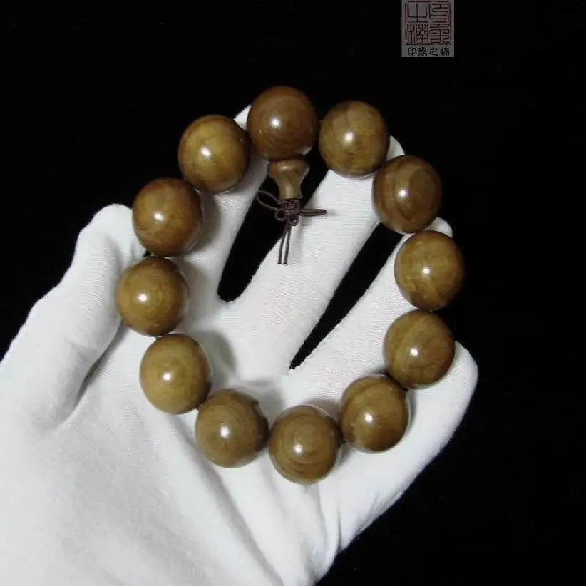 Golden nanmu bracelet, natural wooden Buddhist beads