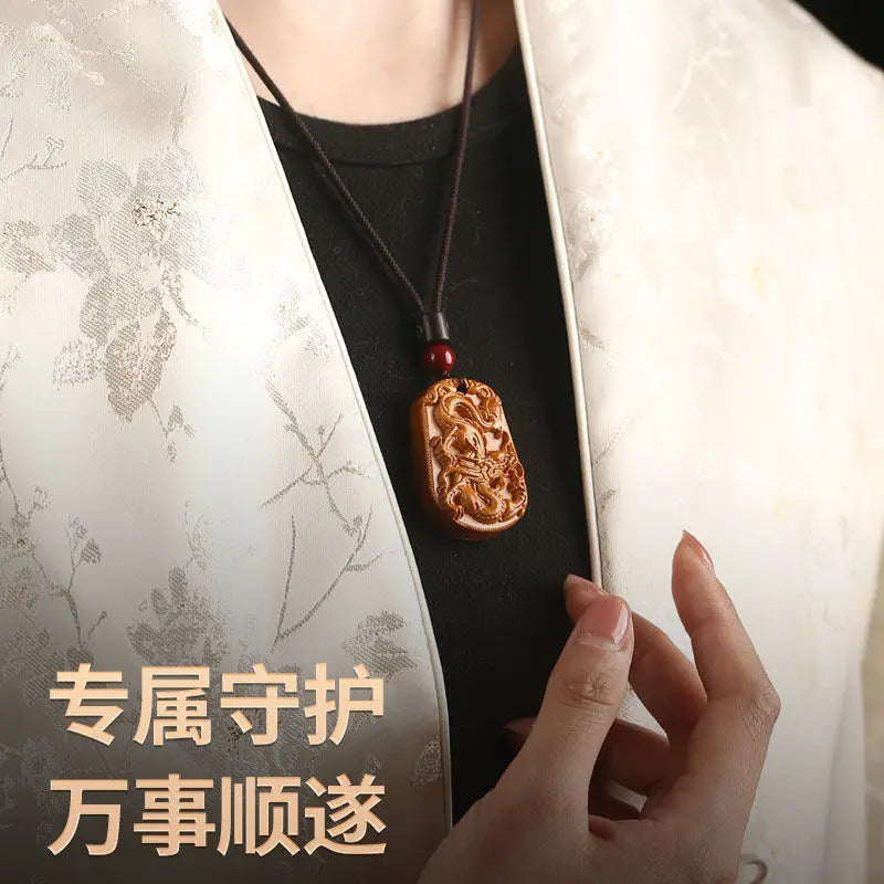 Peach wood zodiac carved pendant