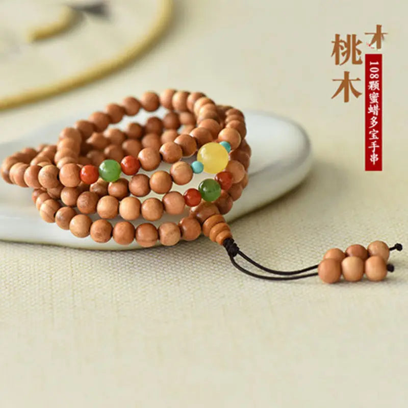 Peach wood multi-circle bracelet, beeswax lucky beads