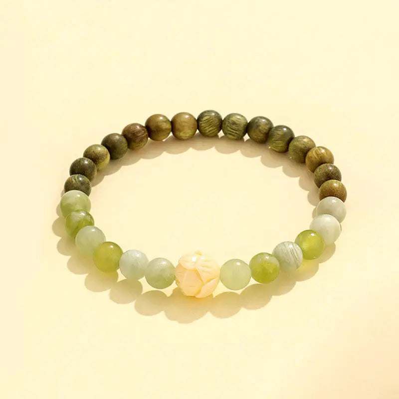 New Green Sandalwood Beaded Couple Bracelet Women's All-match Niche High-end Sense ivory fruit Xiuyu Jade Hand String Headwear