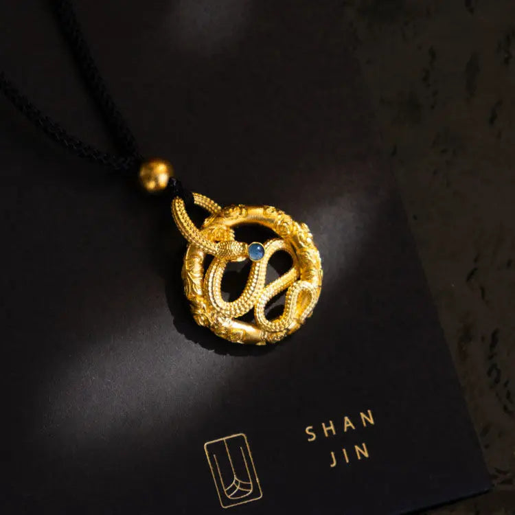 Golden snake round pendant