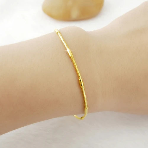 Gold women's bracelet