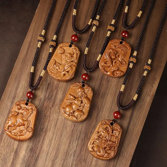 Peach wood zodiac carved pendant