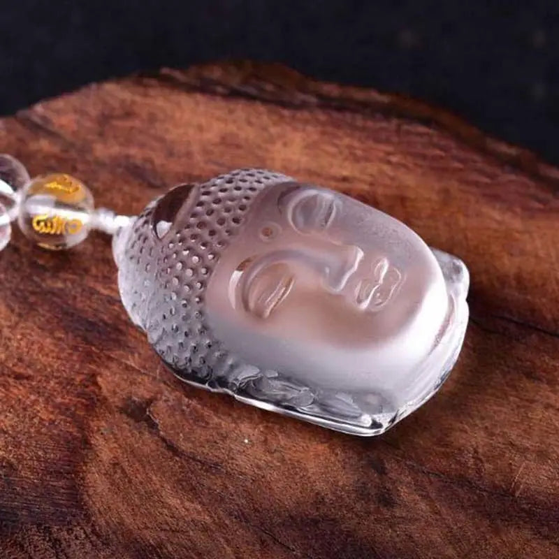 White crystal carved Buddha head pendant