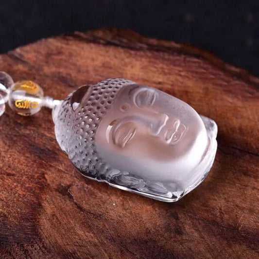 White crystal carved Buddha head pendant