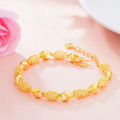Gold women's bracelet