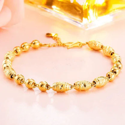 Gold women's bracelet