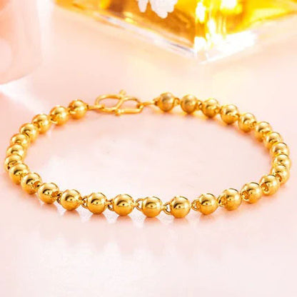 Gold women's bracelet