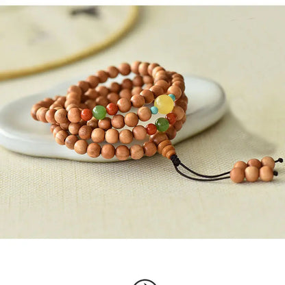 Peach wood multi-circle bracelet, beeswax lucky beads
