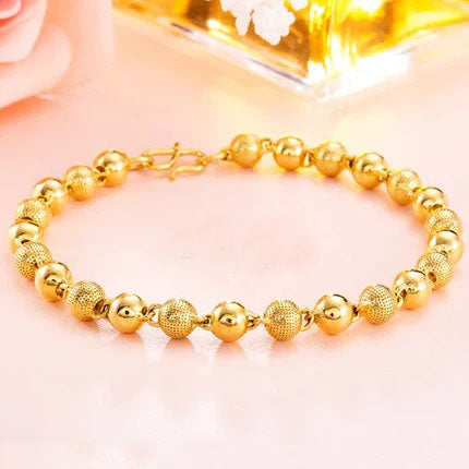 Gold women's bracelet