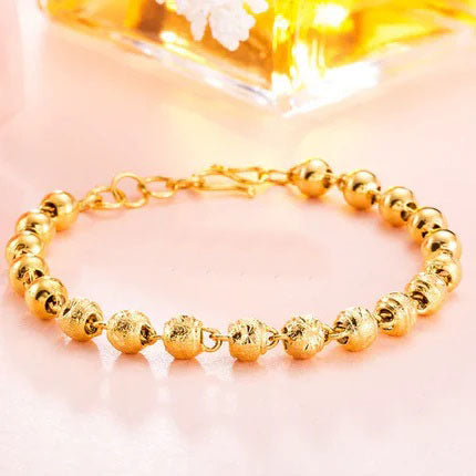 Gold women's bracelet