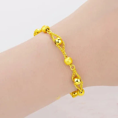 Gold women's bracelet