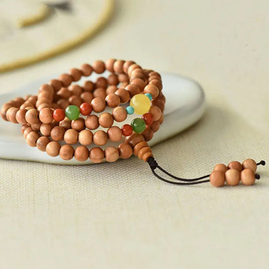 Peach wood multi-circle bracelet, beeswax lucky beads