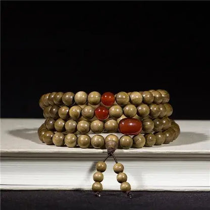 Golden nanmu bracelet, natural wooden Buddhist beads