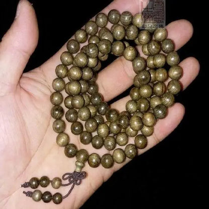 Golden nanmu bracelet, natural wooden Buddhist beads