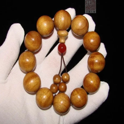 Golden nanmu bracelet, natural wooden Buddhist beads
