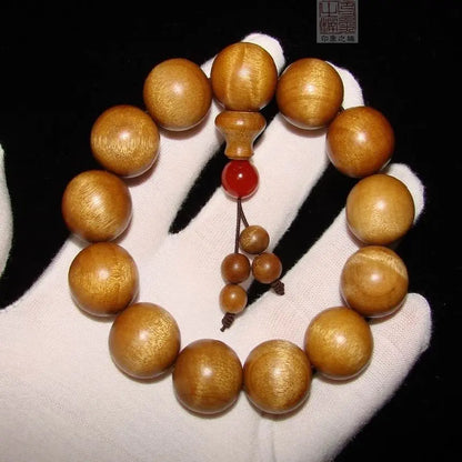 Golden nanmu bracelet, natural wooden Buddhist beads