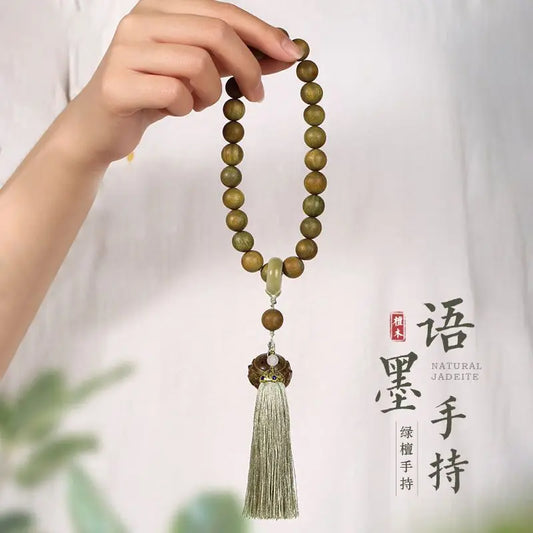 Green sandalwood bracelet with wooden beads and lotus pattern