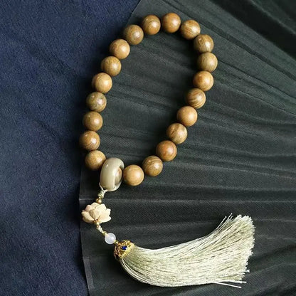 Green sandalwood bracelet with wooden beads and lotus pattern