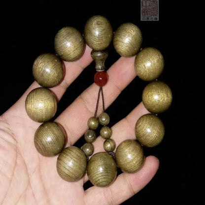 Golden nanmu bracelet, natural wooden Buddhist beads