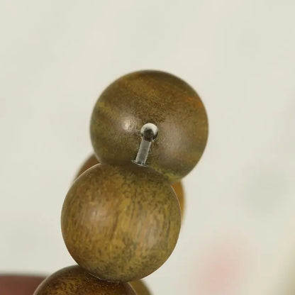Green sandalwood bracelet with wooden beads and lotus pattern