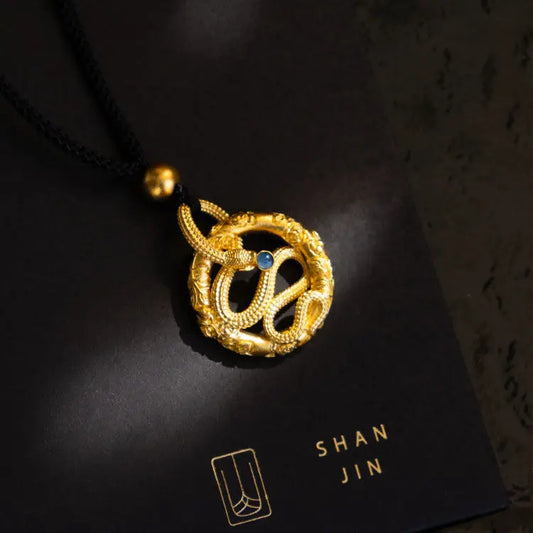 Golden snake round pendant