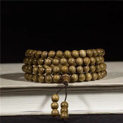 Golden nanmu bracelet, natural wooden Buddhist beads